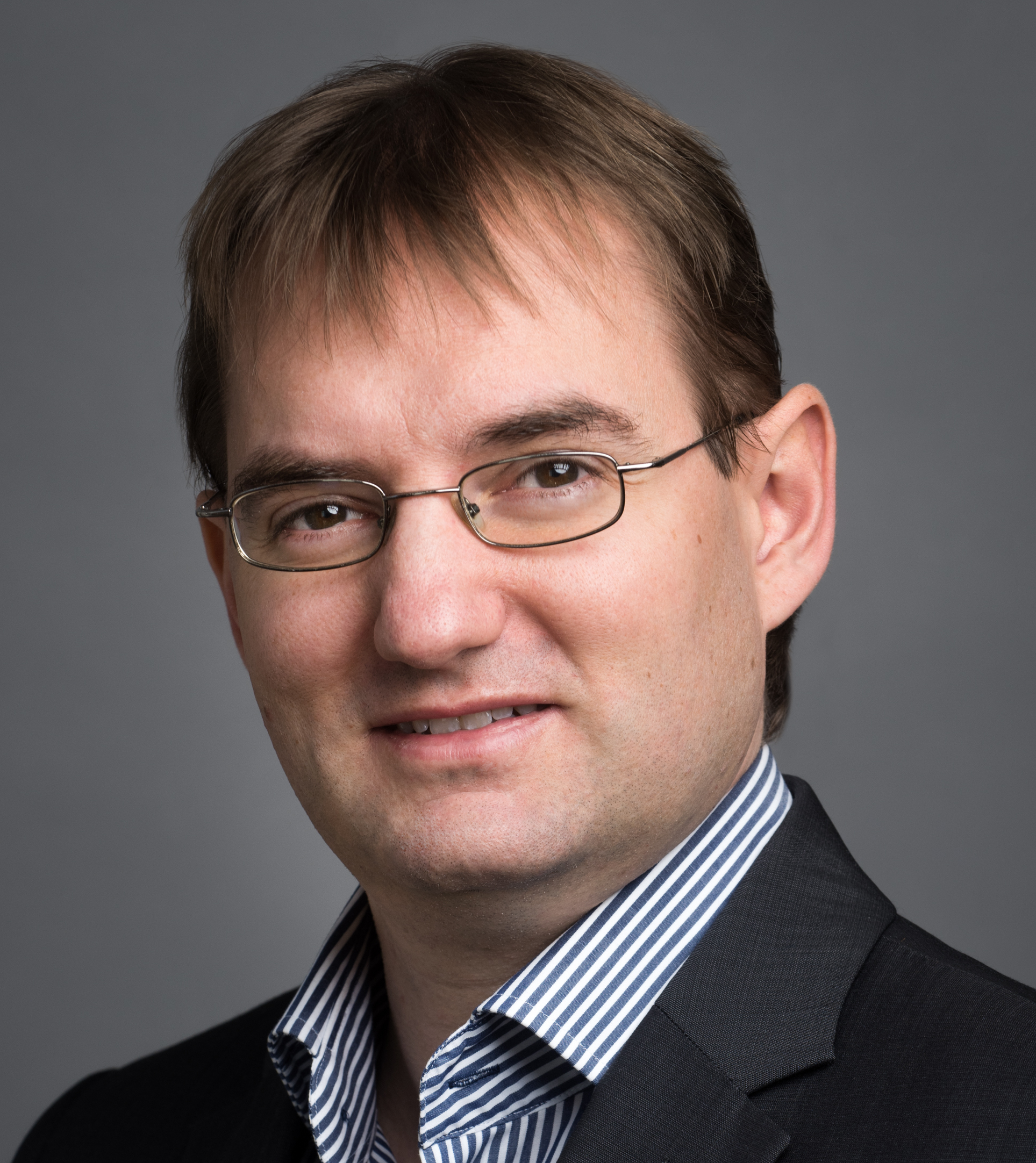 Porträt von Jan Kreutz, Der Klima Coach – Experte für den Quick Check energetische Sanierung im Mehrfamilienhaus.